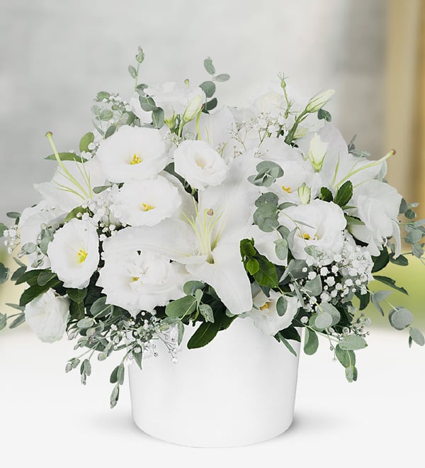 Lilies and Lisianthus in Ceramic Vase