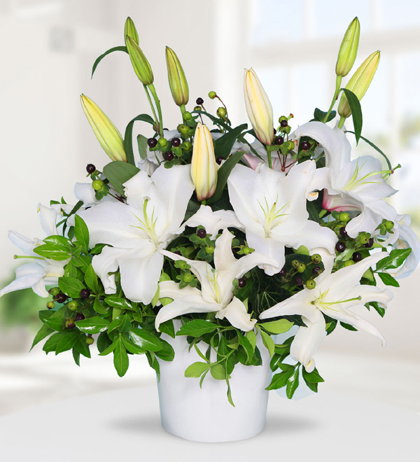 White Lilies in Ceramic Vase